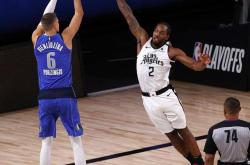 爱游戏体育-穆古鲁扎巅峰对决，东契奇与80激战G2分钟，挺进下一轮胜负难料！的简单介绍